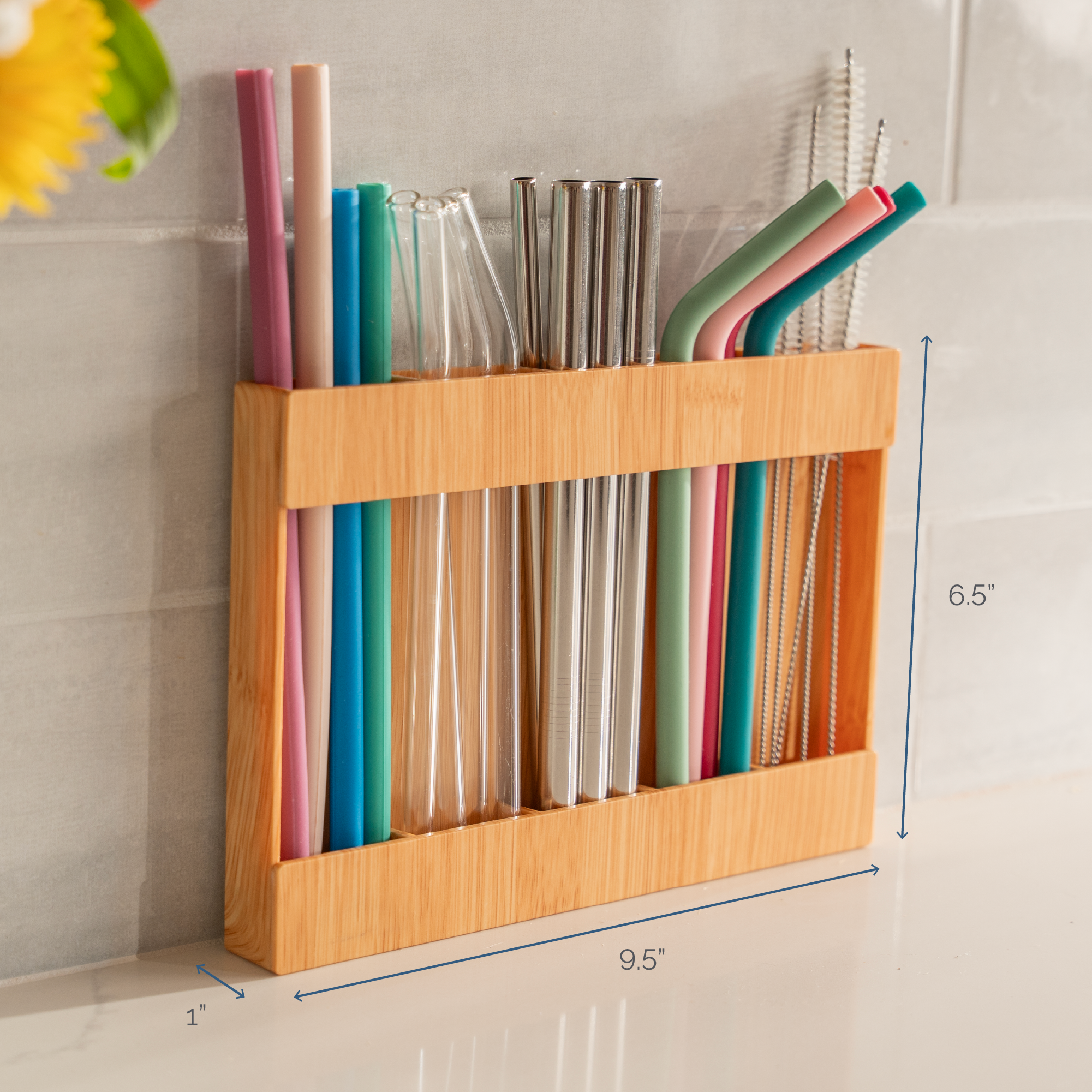 slim design straw holder on counter measuring 9.5" wide by 6.5" tall, and 1" deep.