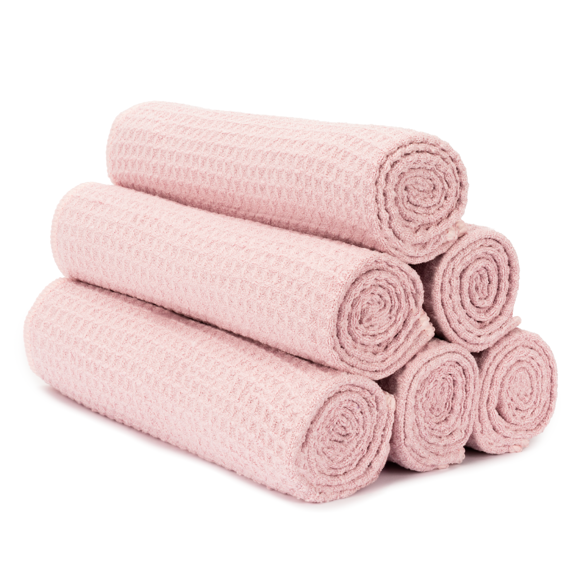 Pink honeycomb gym towels rolled and stacked