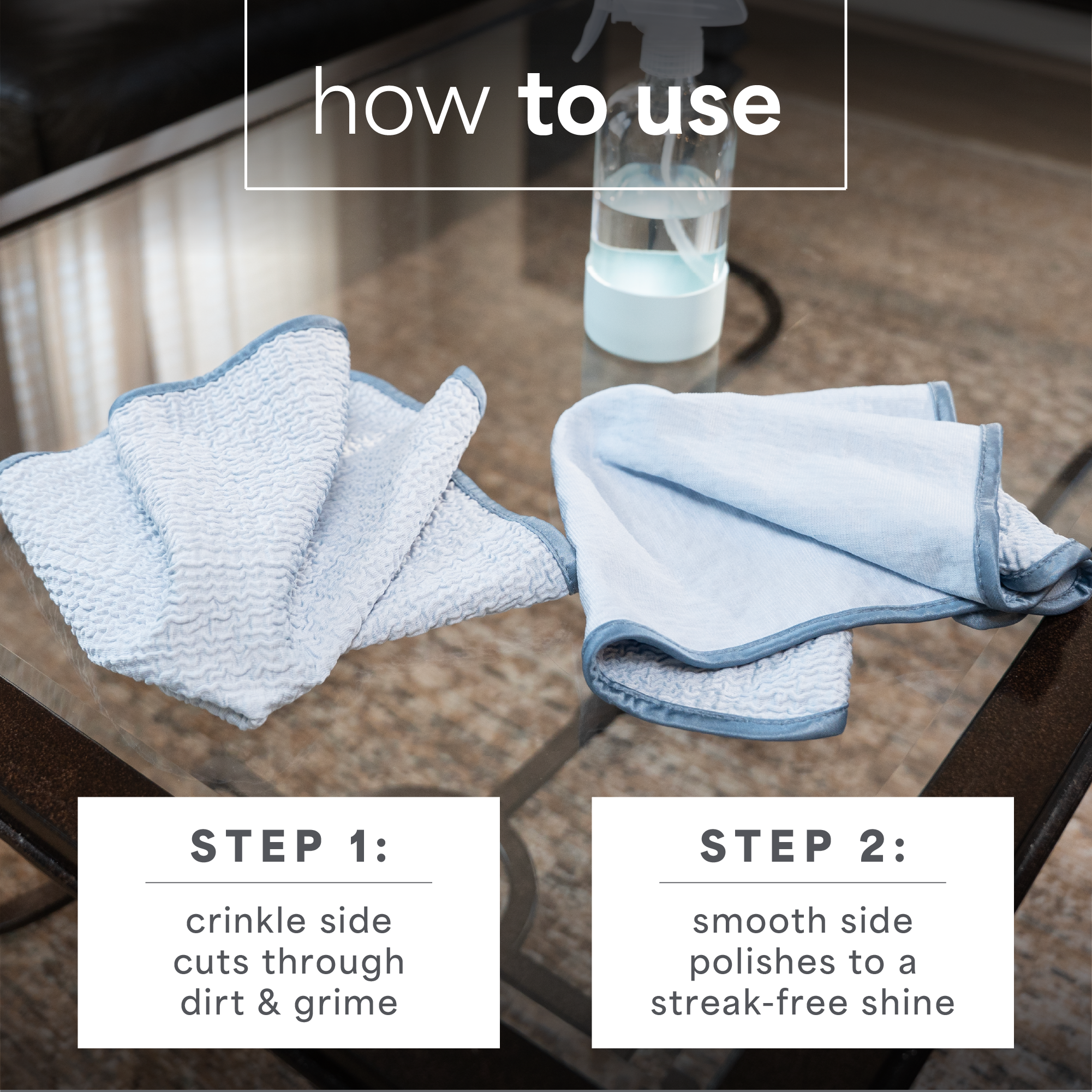 Instruction graphic showing two microfiber cloths on a glass table with a spray bottle in the background. Text at the top reads 'how to use' and two boxes at the bottom explain Step 1: crinkle side cuts through dirt & grime, and Step 2: smooth side polishes to a streak-free shine.