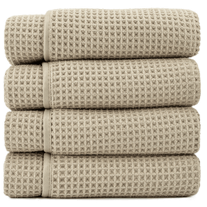 stack of 4 tan waffle weave bath towels