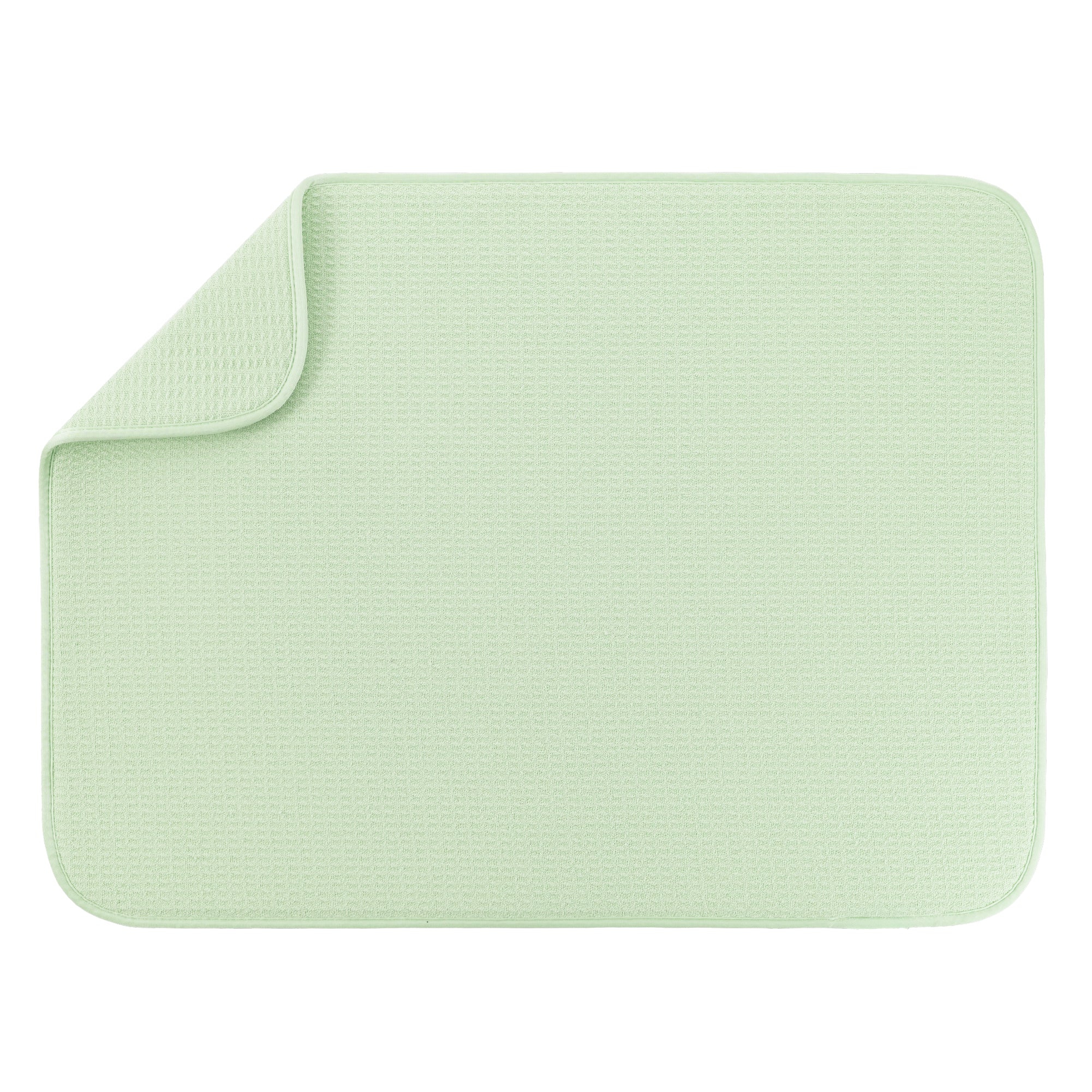A light mint green textured dish drying mat with rounded corners, shown on a plain white background with one corner folded over to reveal the underside.