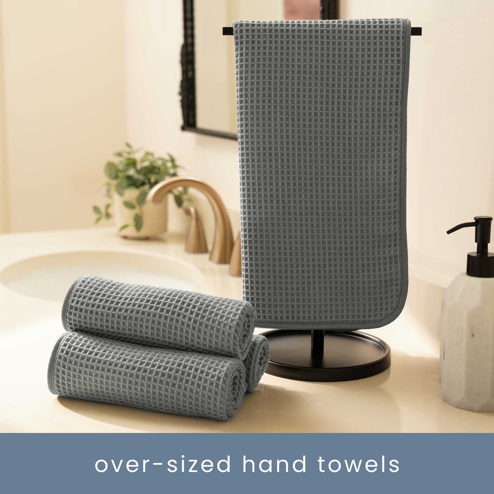 Oversized hand towels on a bathroom counter