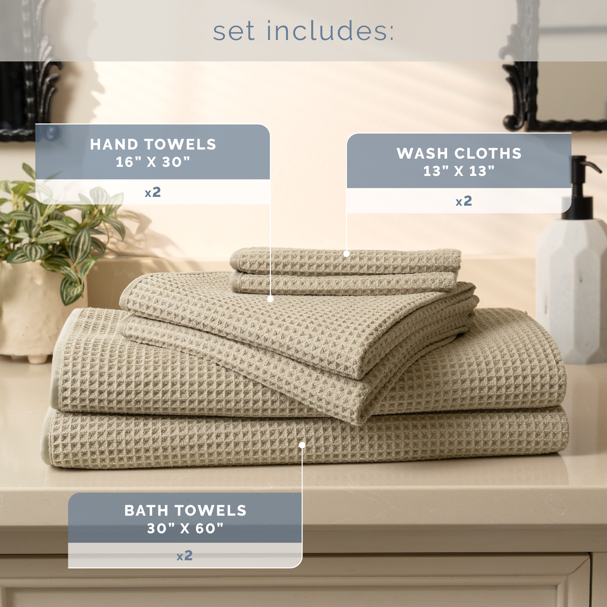 Set of tan towels including hand towels, washcloths, and bath towels on a bathroom counter.